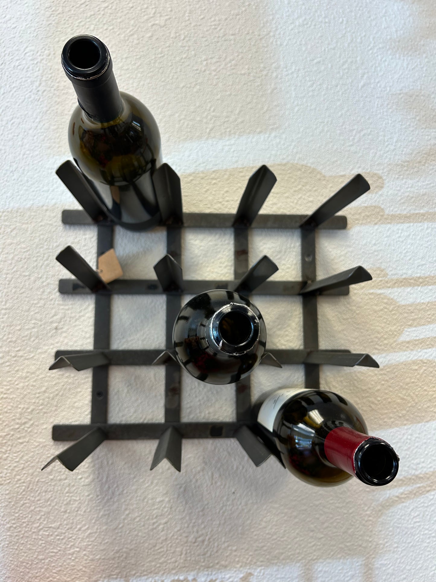 Iron wall wine rack